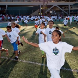 Rushing the field at the sports camp